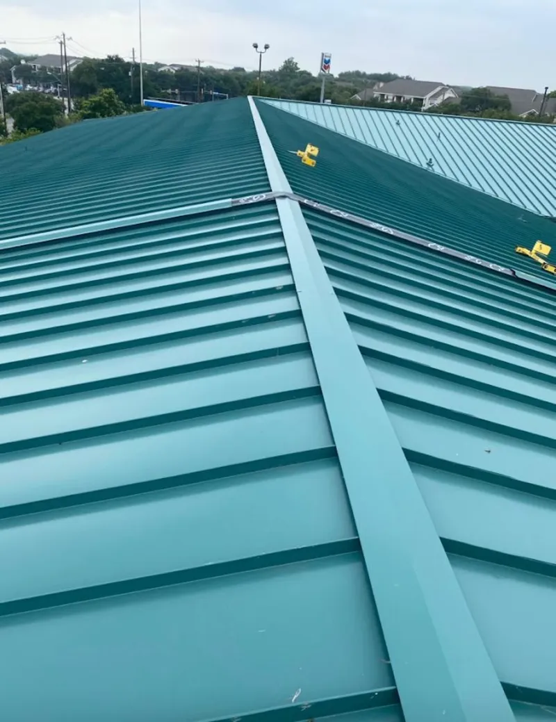 Green commercial metal roof ridge and valley for Metal Roof Repair in Hillside